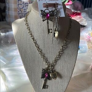 Betsey Johnson Gold Necklace with Pink Gem and Charms
